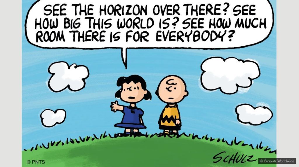 Peanuts comic strip - Looking at the horizon, Lucy motions to Charlie Brown that there is so much room for everybody