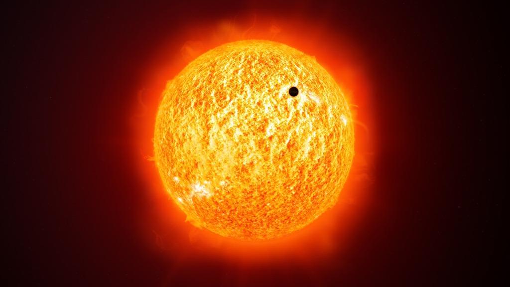 Mercury visible as a small black dot crossing the Sun