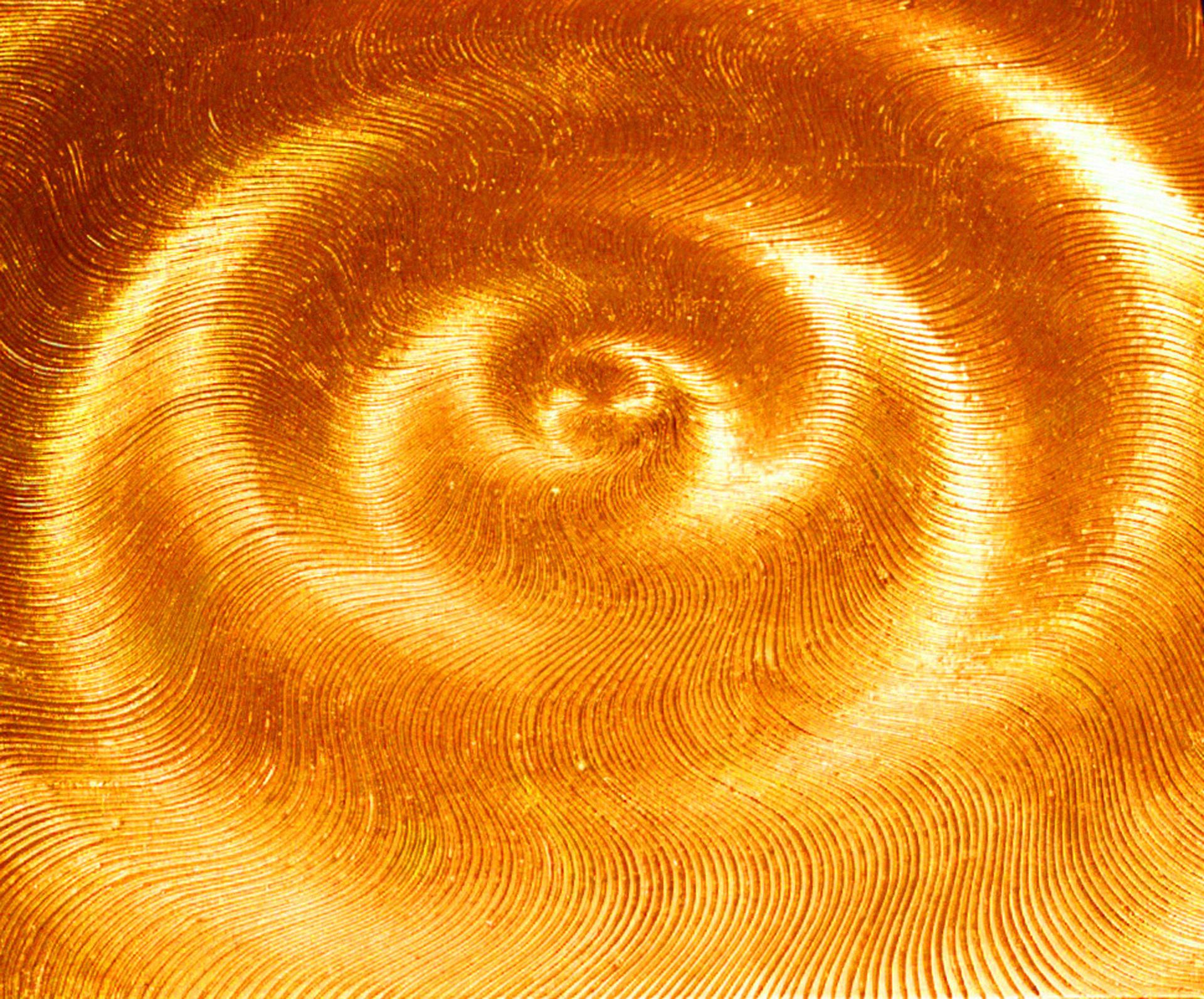 A mandala formed by spirals of golden wavy sun-like energy