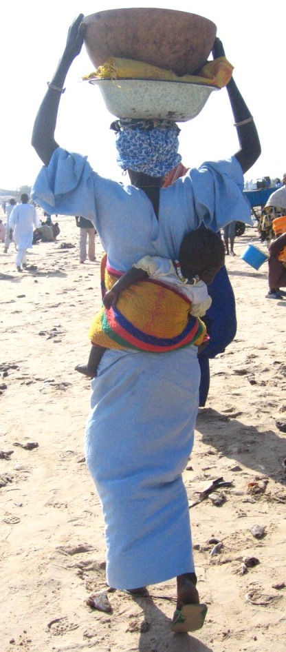 African mother wears her baby
