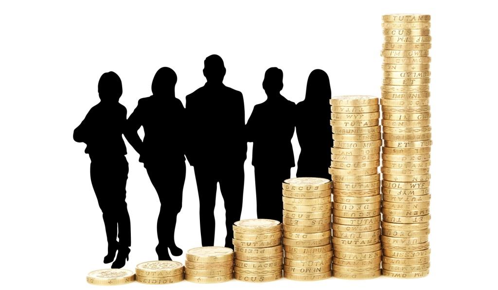 Graphic of people in silhouette in the background, piles of coins of different heights in the foreground