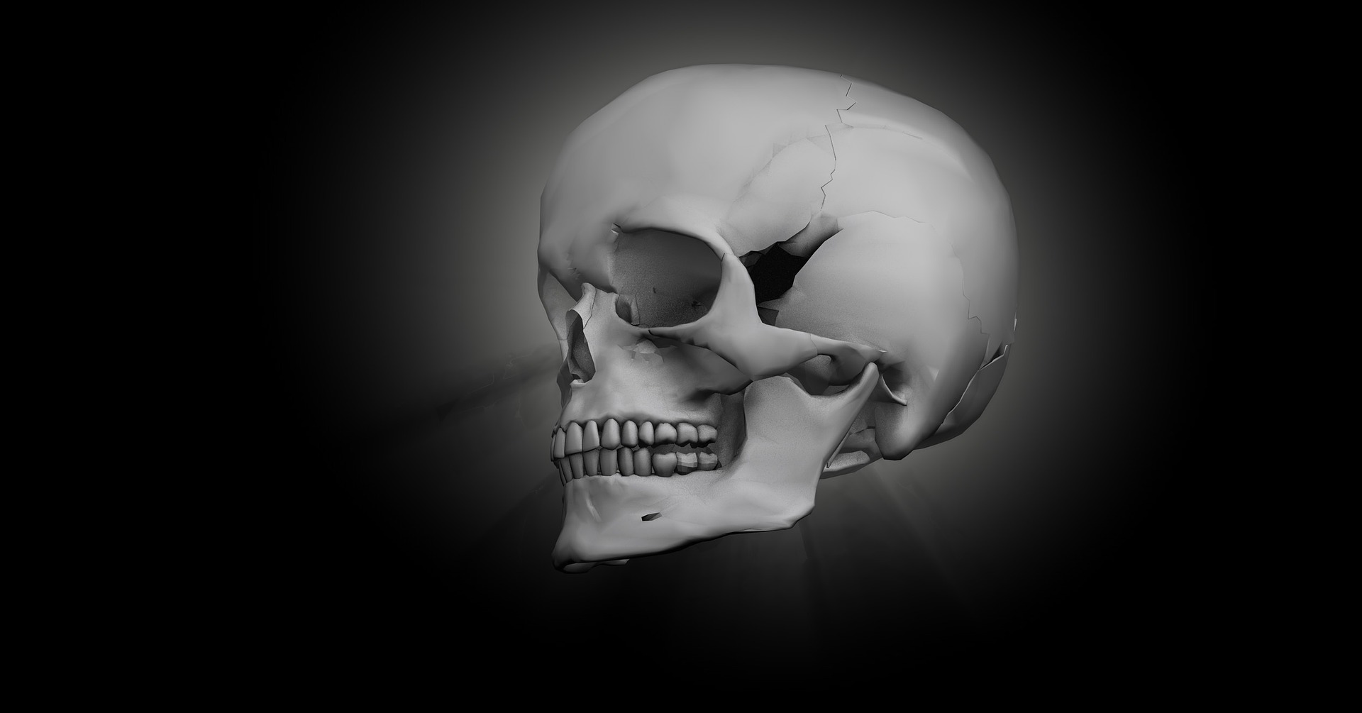 An eerie skull suspended in space against a black background
