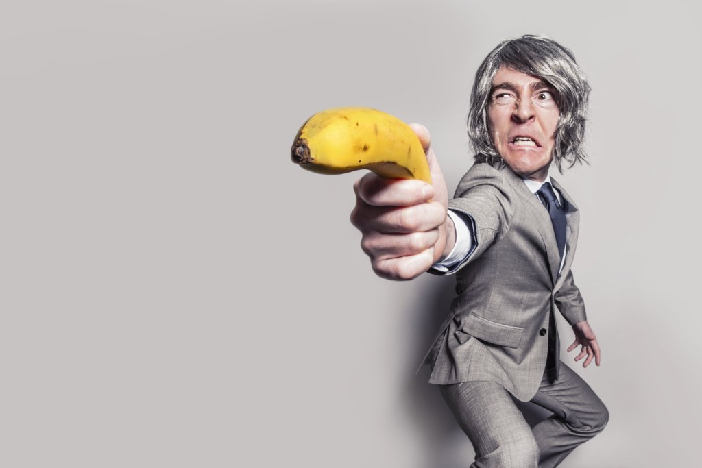 Banana Gun aimed by suited man