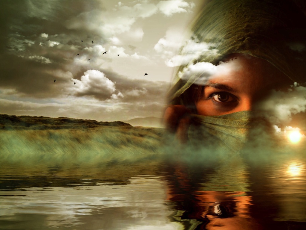 Nature fantasy of atmospheric seascape with mist and clouds and background land and birds and to the right a young woman's face faded into the sky intently looking at us