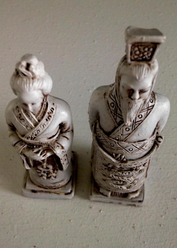 Oriental figurines of man and woman