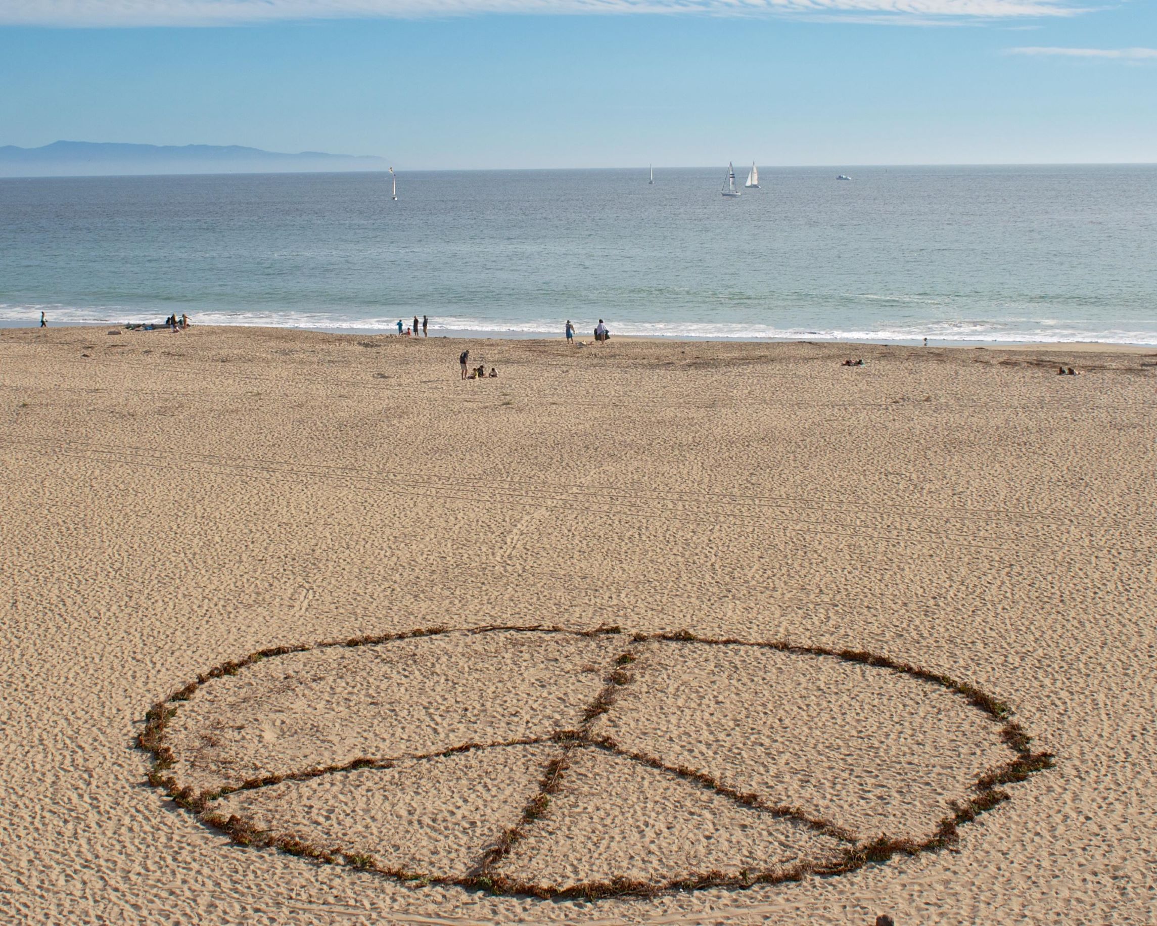 Beach peace sign