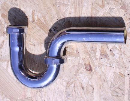 Shiny metal plumbing trap