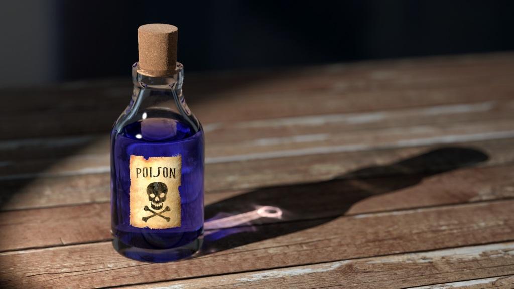 Poison bottle on table