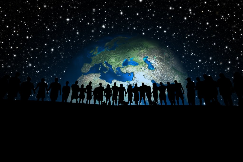 Graphic of large group of silhouetted people under the Earth and a starry night sky