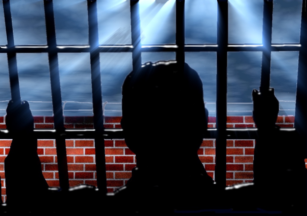 Man silhouette in prison cell