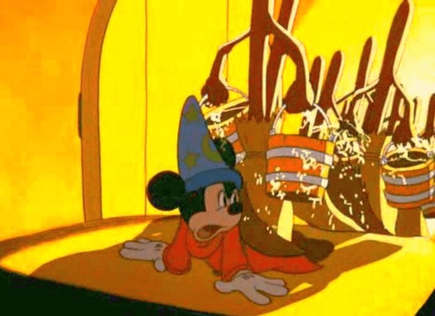 A screenshot from Disney's Fantasia, showing the sorcerer's apprentice overwhelmed with brooms carrying pails of water