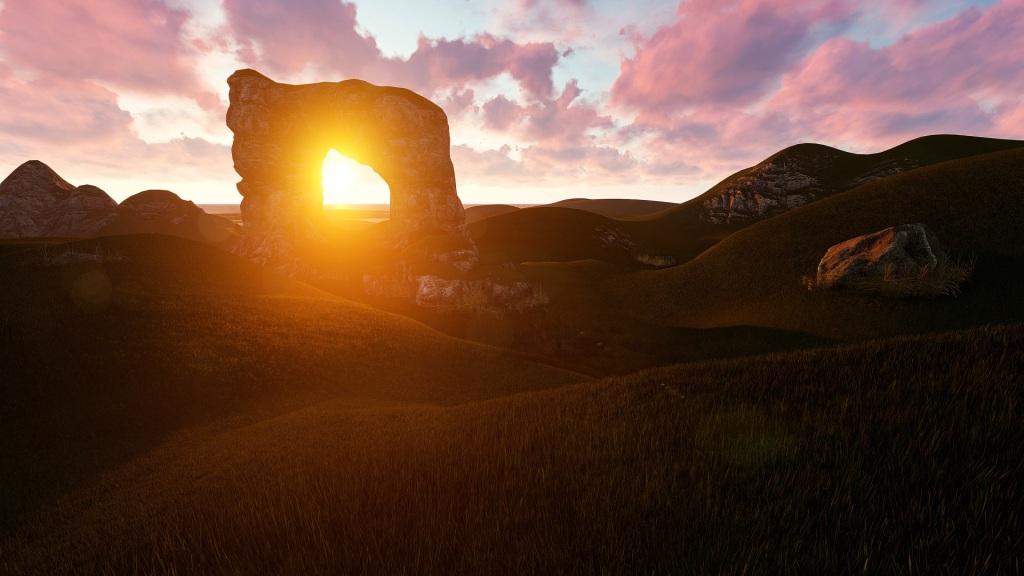 Sun through natural stone arch