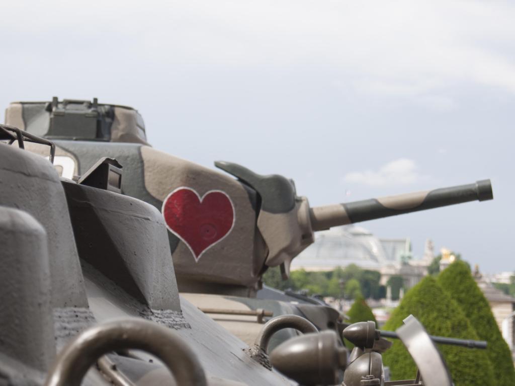 Tank with heart image on its side