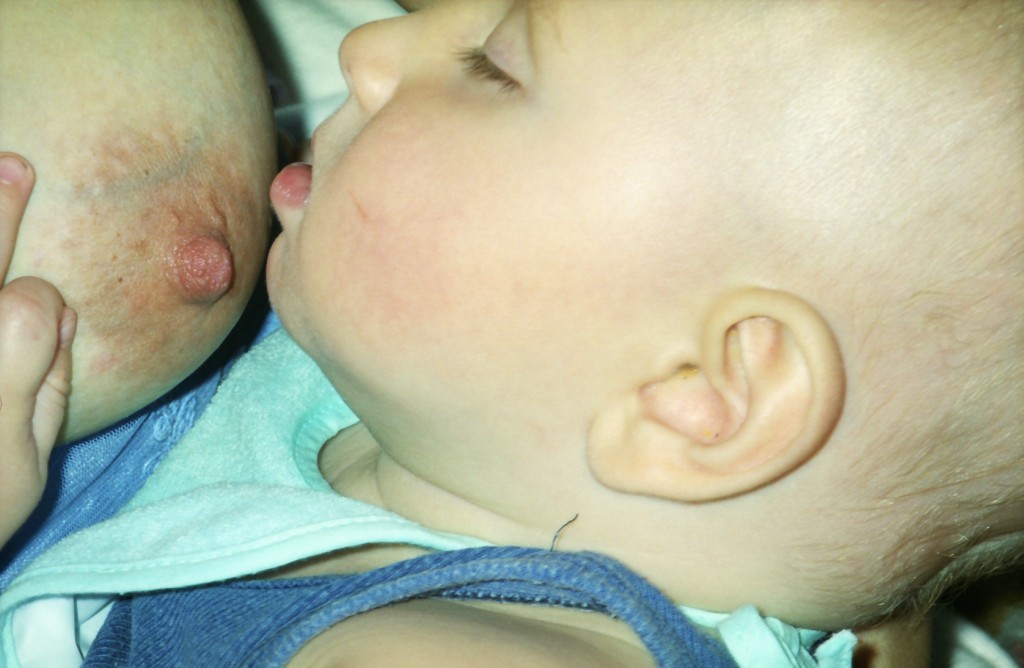 Entranced baby breastfeeding