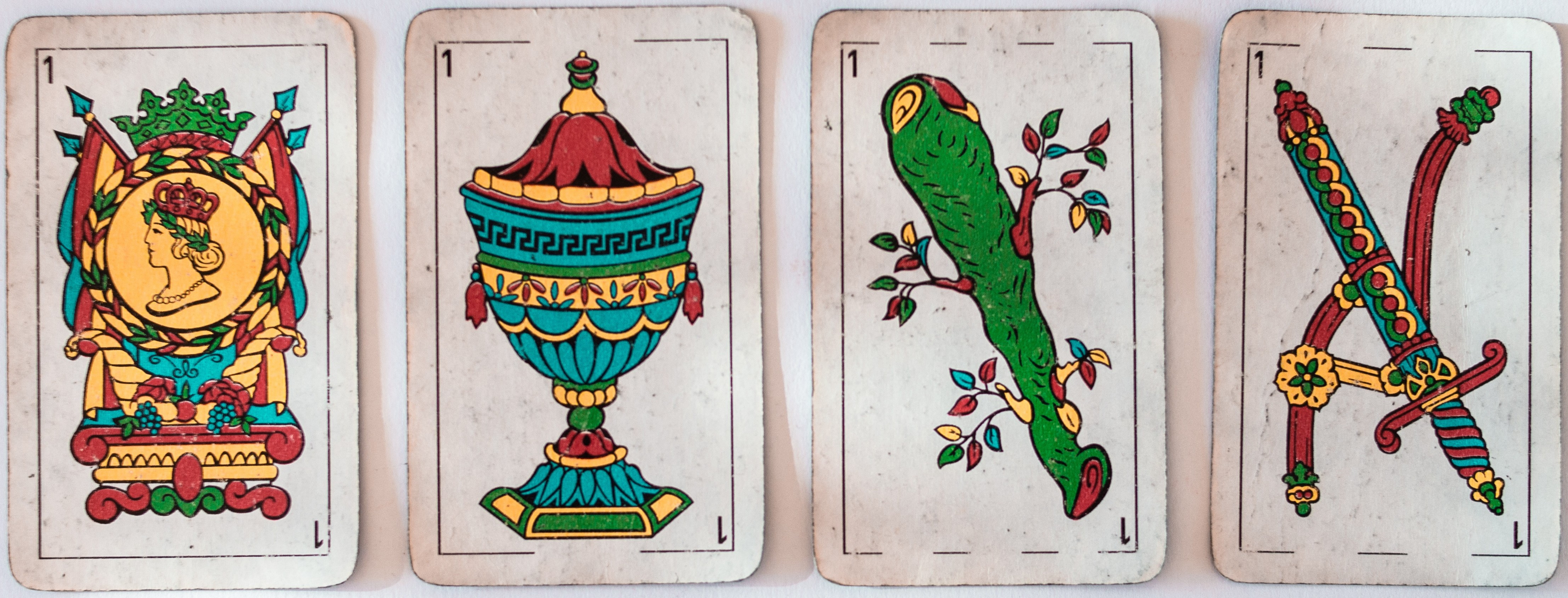 All four aces from an old Tarot deck
