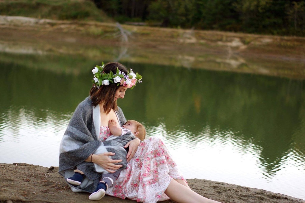 Breastfeeding by river