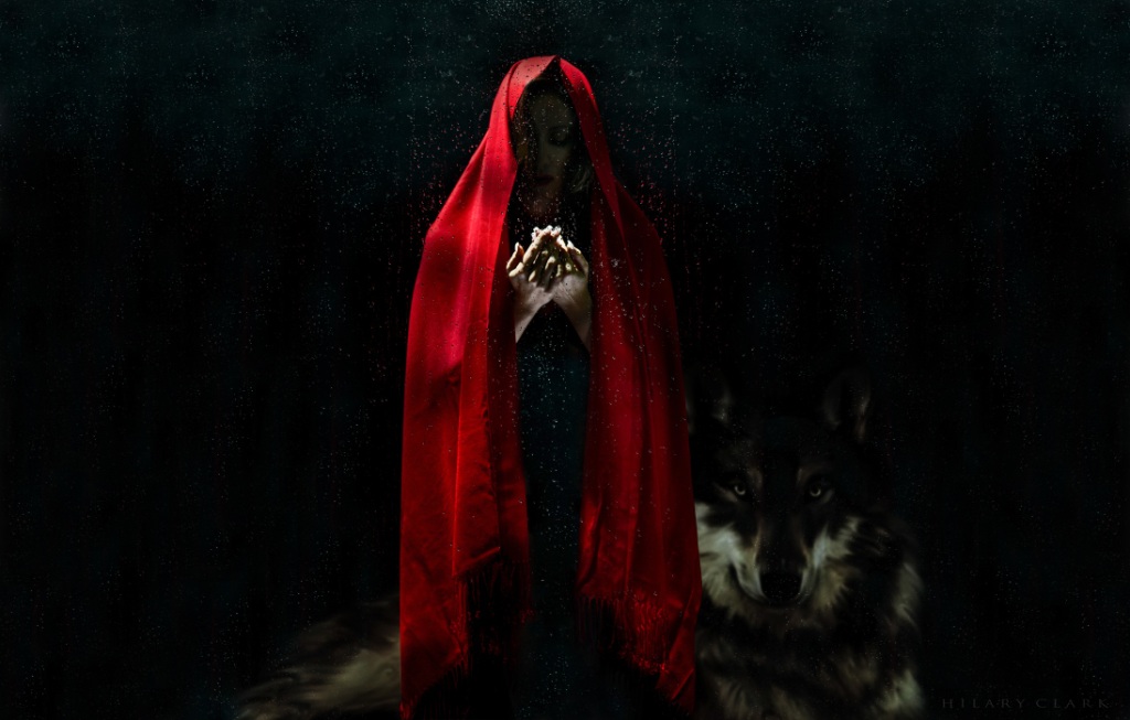 Red-cloaked woman and wolf