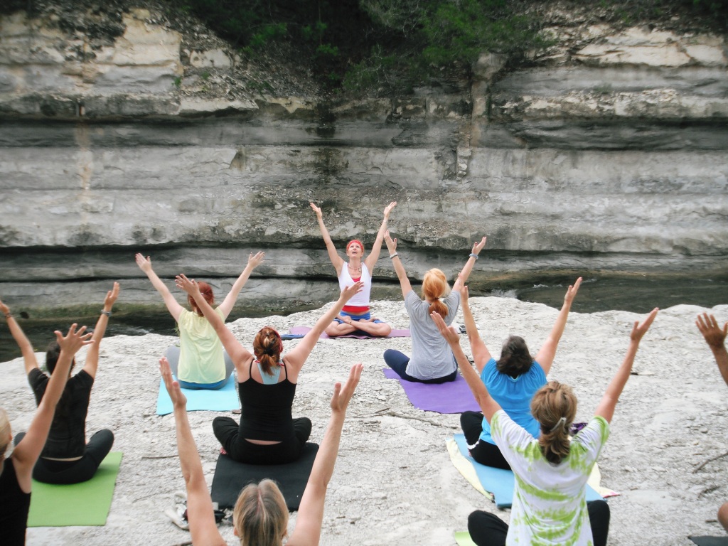 Women in harmony doing yoga in nature